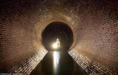 Urban Explorers Stunning Photographs Of The Sewers And Skylines Of New