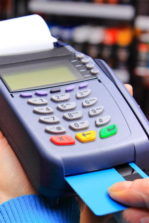 Using Payment Terminal For Paying Credit Card In Shop Finance And