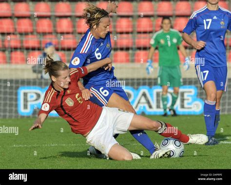 Germanys Simone Laudehr L Fights For The Ball With Frances Sandrine Soubeyrand During The