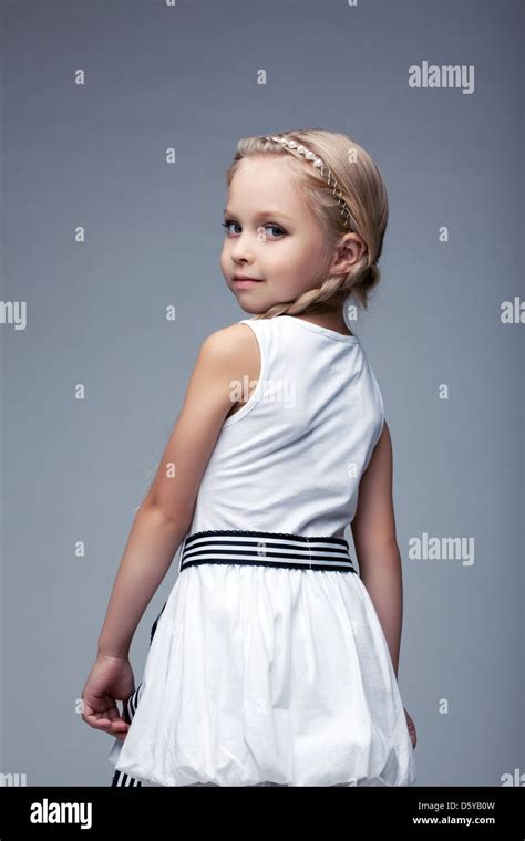 Pretty Blonde Little Girl In White Dress Stock Photo Alamy