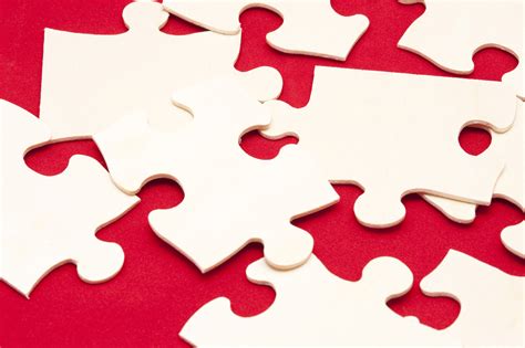 Free Stock Photo 10755 Scattered white jigsaw puzzle pieces ...