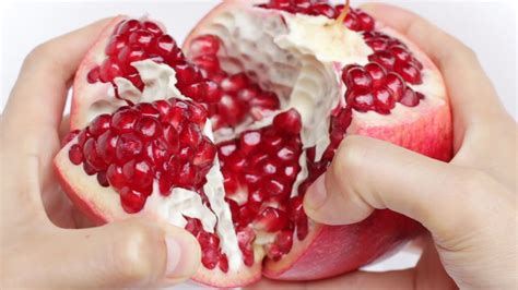 Then, place it in a bowl of cold water to help loosen the seeds, and use your hands to pry apart the fruit along the lines you scored. How to Eat Pomegranate | Best way to open a Pomegranate - YouTube