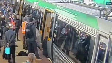 Australian Train Passengers Rally To Push Entire Train Carriage Off Trapped Man Video