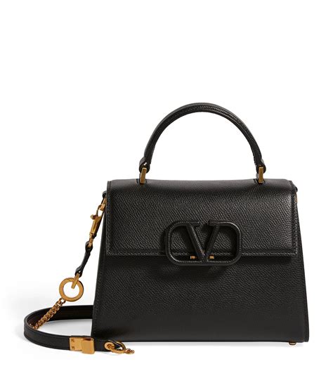 Valentino Small Leather Vsling Top Handle Bag In Black Save 6 Lyst