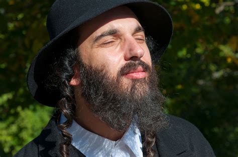 Portrait Of Young Orthodox Hasdim Jewish Man With Eyes Closed Stock