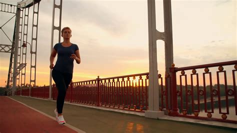 Woman Sport Athlete Running In The Morning Sunrise Girl Jogging