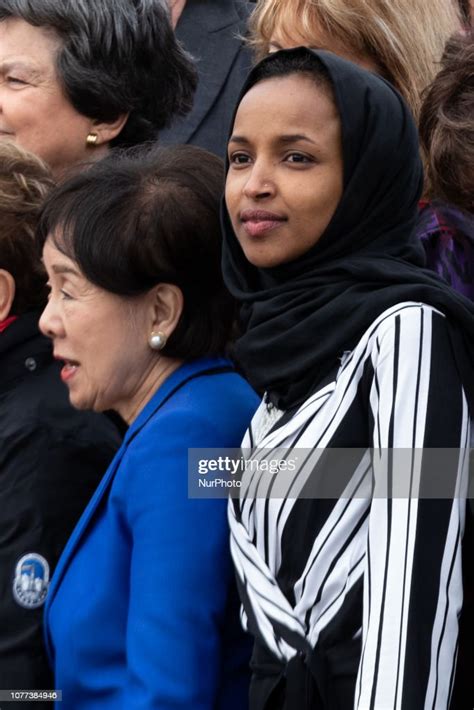 Rep Ilhan Omar Prepares To Take A Group Photo With Speaker Nancy