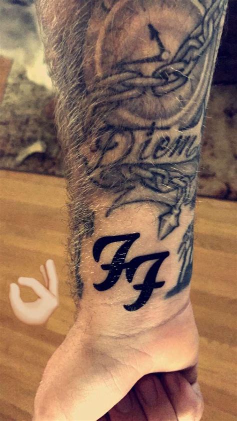 So i figured for my first tattoo i'd merge those two albums into this. When you have a perfect spot for one of the Foo Fighters temporary tattoos that came with the ...