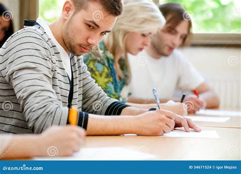 College Student Trying To Copy Test Stock Photo Image Of People