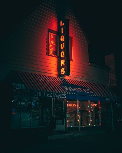 Whites Liquor Vintage Neon Sign At Night Montauk New York Stock Image