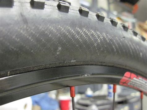 threads showing in sidewall of tire