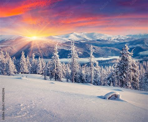 Colorful Winter Sunrise In The Mountains Stock Photo Adobe Stock