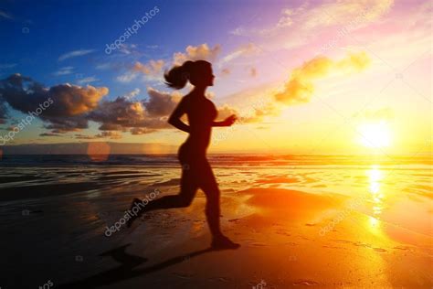 Running Girl At Sunset Silhouette — Stock Photo © Sdecoret 52812125