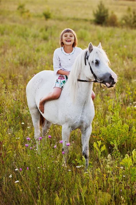 Little Girl Riding A Horse Stock Photo Image Of Countryside 43489646
