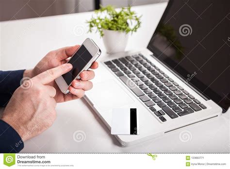 How long does it take for a payment to clear? A Man Is Going To Pay For The Goods In The Internet Using Credit Stock Image - Image of desk ...