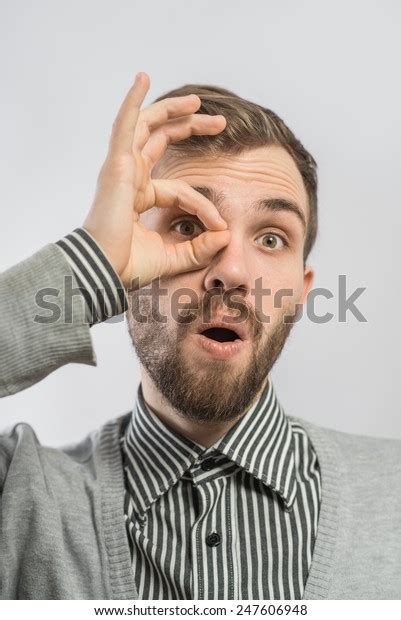 Man Hand Over Eyes Looking Through Stock Photo 247606948 Shutterstock