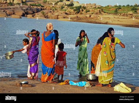 Indian Women Wash The Tungabhadra River At Hampi Southern India Asia