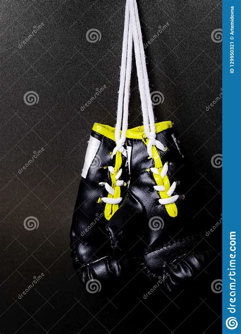 Two Hanging Black Boxing Gloves On Black Background Stock Image Image