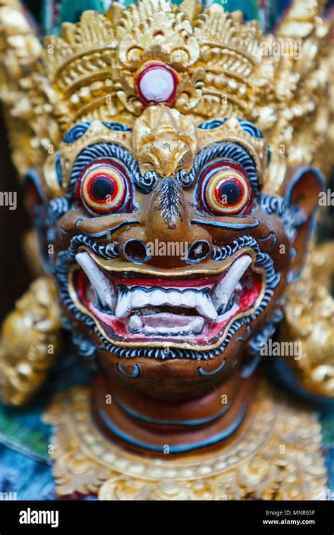 Close Up Of A Traditional Balinese God Statue In Bali Temple Stock