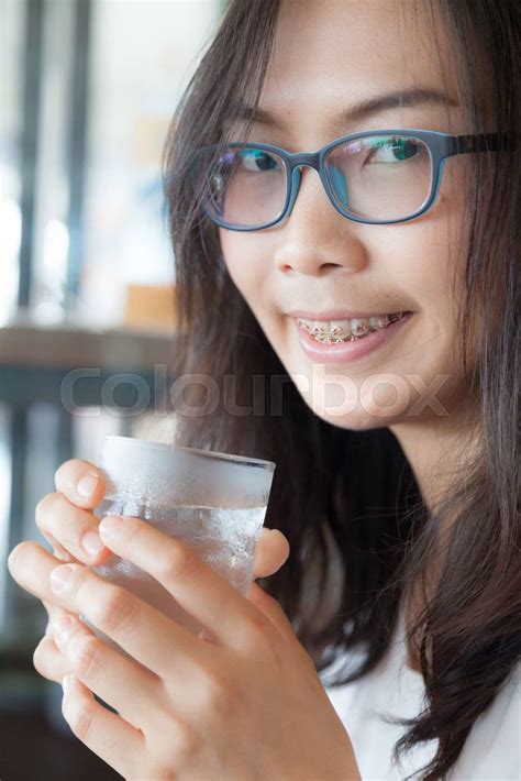 asia woman drink water stock image colourbox