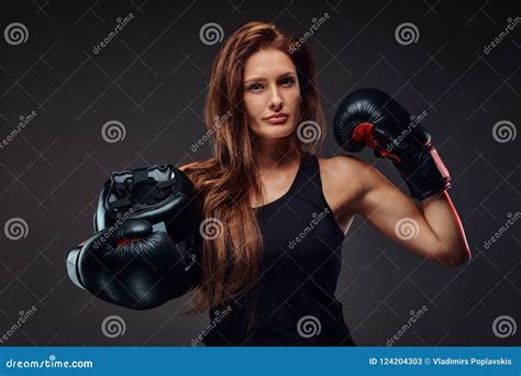 Beautiful Sportive Female Boxer In Sportswear Wearing Boxing Gloves Shows Muscles Isolated On