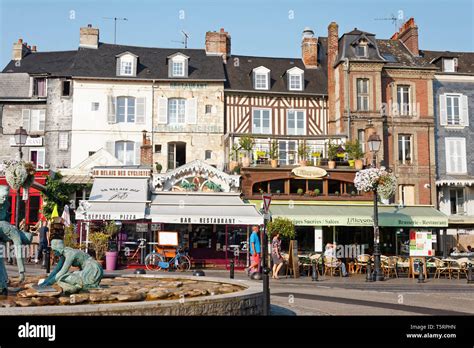 City Scene Fountain Round About Old Buildings Shops Restaurants