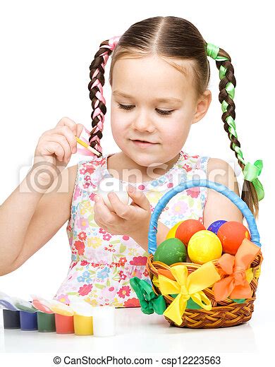 Little Girl Is Painting Eggs Preparing For Easter Isolated Over White