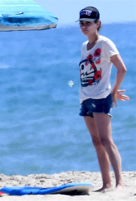 Ashton Kutcher Mila Kunis Play Football On The Beach Photos