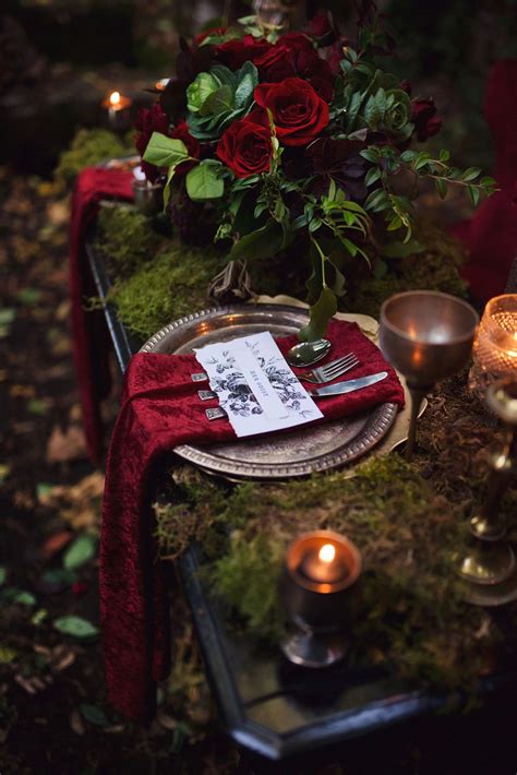 This Tabletop Scene—featuring Moody Scarlet Rose Centerpiece Off Set