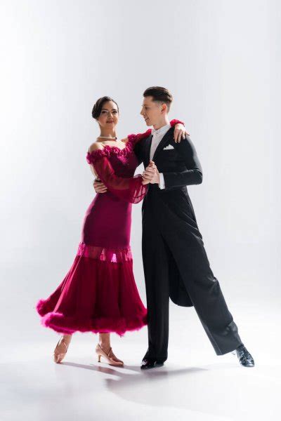 Elegant Young Couple Ballroom Dancers Red Dress Suit Dancing White