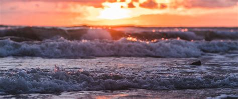 Download Wallpaper 2560x1080 Sunset Sea Waves Beach Sun Cloud Dual