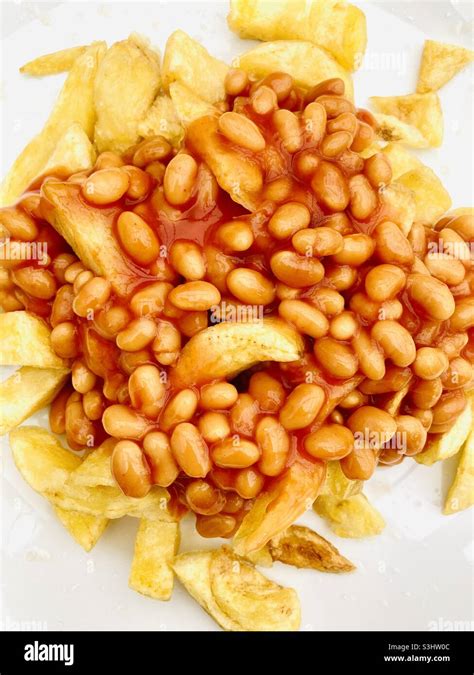 Chips And Baked Beans Stock Photo Alamy