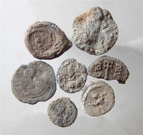 8 Roman And Byzantine Lead Tokens And Bullae