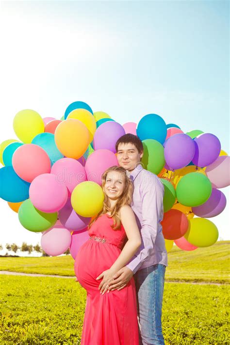 Young Healthy Beauty Pregnant Woman With Her Husband And Balloon Stock Image Image Of Love