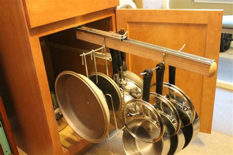 Discover pot racks on amazon.com at a great price. Pull Out Under Cabinet Hanging Pot and Pan Lid Rack ...