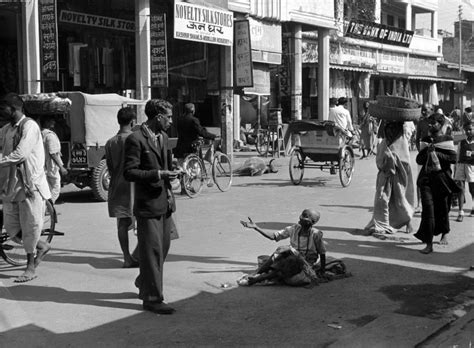 A Beggar Sits In The Middle Of The Street In Banares Varanasi C1950s Old Indian Photos