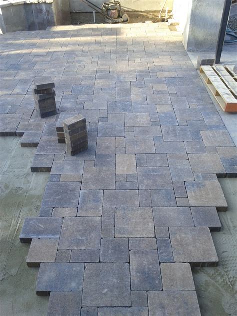 How To Extend Your Concrete Patio With Pavers Dengarden