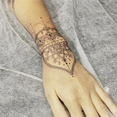 Little crown tattoo for girls. Cute bracelet tattoo | Hand tattoos, Cuff tattoo, Mandala ...
