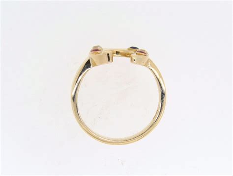 Victorian Yellow Gold Diamondruby And Sapphire Horse Shoe Ring