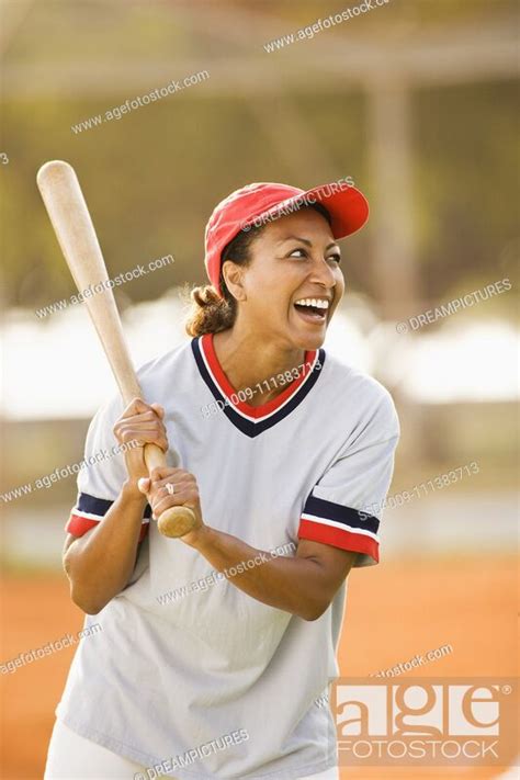 African American Woman Playing Baseball Stock Photo Picture And
