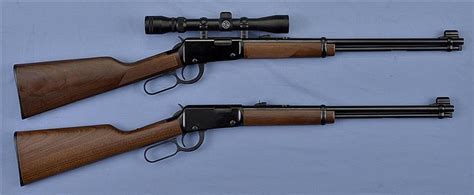 Two Lever Action Rifles A Henry Repeating Arms 22 Magnum