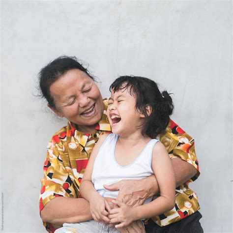 Asian Grandmother And Her Granddaughter By Stocksy Contributor Chalit Saphaphak Stocksy