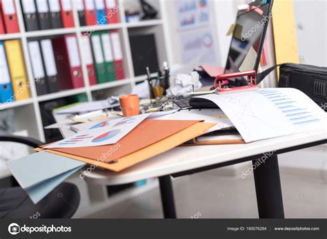 Messy And Cluttered Desk — Stock Photo © Thodonal 160076284
