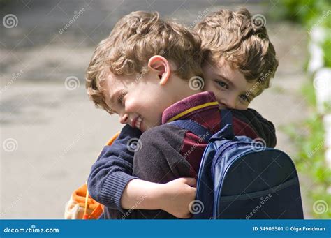 Twins Embrace Each Other To Hug Stock Photo Image