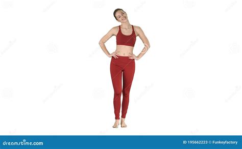 Mature Woman Stretching Her Neck And Walking On White Background Stock