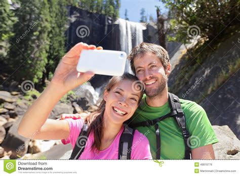 Couple Hiking Taking Smartphone Selfie In Yosemite Stock Photo Image