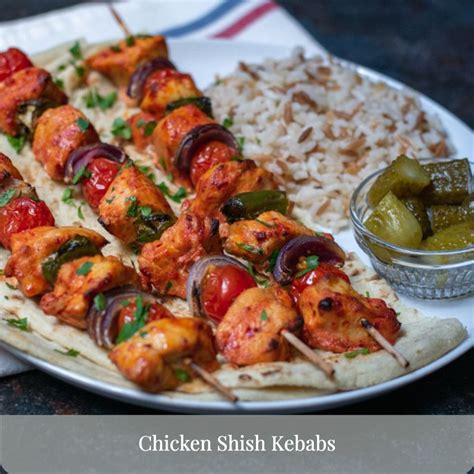Chicken And Vegetable Skewers Served With Pita Bread Turkish Rice