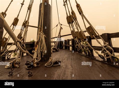 The Ropes And Mast Of An Old Wooden Sailing Ship In Detail Stock Photo