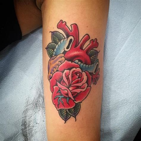The rose represents love and purity of feelings. Rose Heart Tattoo | Best Tattoo Ideas Gallery