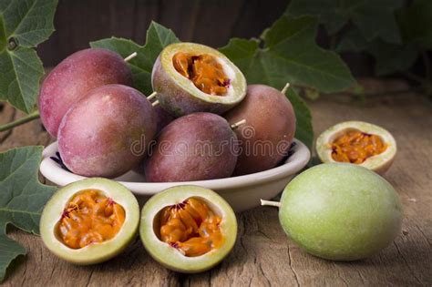 Fruits Of Gulupa On Vine Wood Table Stock Photo Image Of Juice